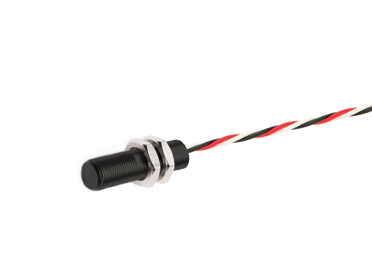 A cylindrical black Analog Hall Sensor from the AH Series features threaded metal nuts and a twisted red, black, and white wire extending from it, isolated on a white background. by Standex Detect