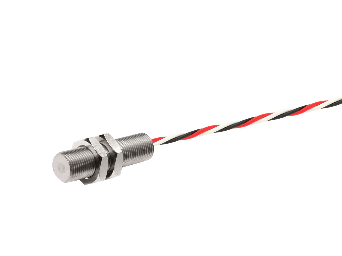A DSO Series cylindrical metal speed sensor with two nuts, attached to a twisted pair of red, black, and white wires, shown against a white background. by Standex Detect