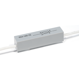A rectangular gray Reed Relay from the HE Series with white wires attached at both ends, labeled HE24-1A69-150 and featuring a printed circuit symbol on the top surface. by Standex Detect
