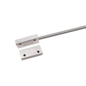 Two rectangular metal blocks with holes, one connected to a flexible, coiled metal conduit or cable&mdash;part of the MK27 Series Reed Sensor&mdash;are displayed on a white background. by Standex Detect