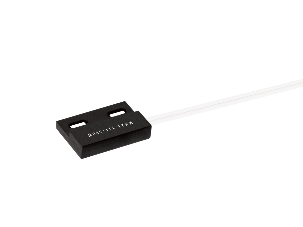 A small black rectangular MH21 Series Hall Sensor with white markings and two white wires extending from one side, isolated on a white background. by Standex Detect
